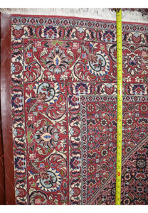 Persian Bijar Bukan rug border measured for size showing dense double-weft hand-knotted wool construction