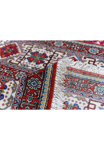Close-up of Persian Qum kork rug front and back showing fine 400 KPSI senneh knot construction