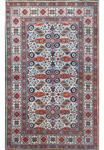 Authentic 4'5 x 7'2 Persian Qum kork wool rug full view with geometric allover tribal design on ivory field
