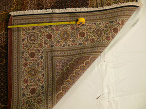 Experience the unparalleled beauty of our Persian Tabriz Rug with Mahi Design, featuring intricate detailing and expert craftsmanship