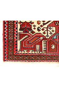 Edge detail of the Persian Shahsawan rug, highlighting its robust and colorful weaving