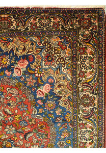 Corner detail of a Persian Garden Design Bakhtiar Tribal Rug, highlighting the hand-knotted craftsmanship