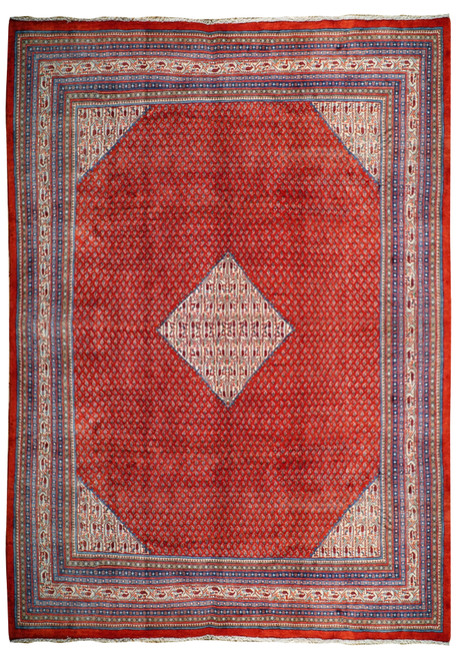 Stunning medallion design on a 10x13 Persian Sarough Mir rug. The intricate details and rich colors create a timeless and sophisticated look