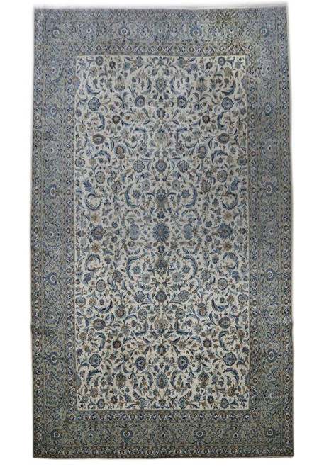 Majestic allure! Our Ivory Blue 11' x 18' Persian Signed Shadsar Kashan Rug displayed in full, showcasing its expansive size and captivating blend of hues.