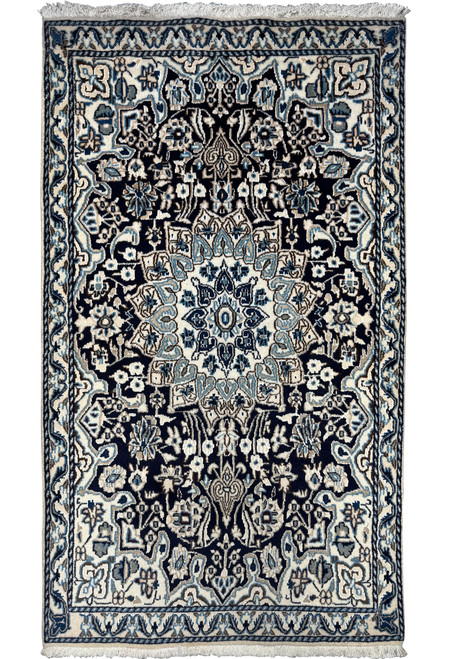 Full view of a 3x5 Nain Persian rug showcasing its intricate floral and geometric design