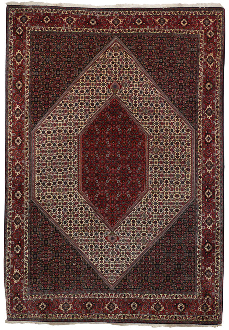 6'9 x 10 Persian Bijar rug full view with bold geometric medallion and red ivory field