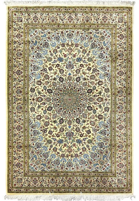 Full view of a 4'5 x 6'7 signed Persian Qum pure silk rug featuring an intricate floral medallion, ivory field, fine knot density, and classic Persian symmetry.