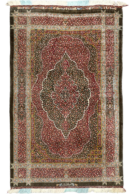 Full view of authentic hand-knotted Qum pure silk rug with thousand flower field on burgundy