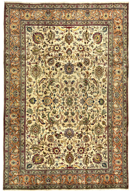 Cream field antique 9x13 Persian Tabriz with allover Shah Abbasi floral design and warm terracotta main border framing