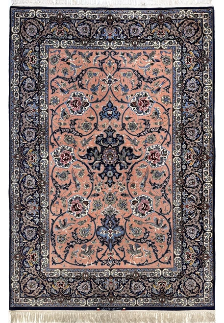 Signed Davari Persian Isfahan wool and silk rug with salmon field, rose cartouches, and paired birds framed by a navy floral main border