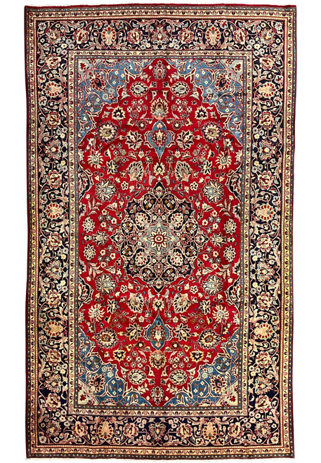 Full overhead view of 8x13 Persian Najafabad rug, rose red field with navy border and layered floral medallion