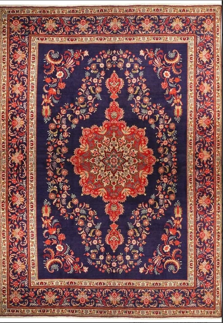 10x13 Persian Tabriz rug shown flat with a central red medallion on an open navy field