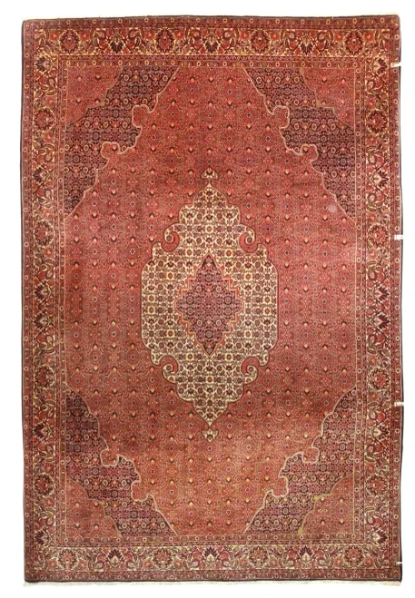 7 x 10 Persian Bijar rug with an ivory medallion and corners on a warm salmon rose mahi field