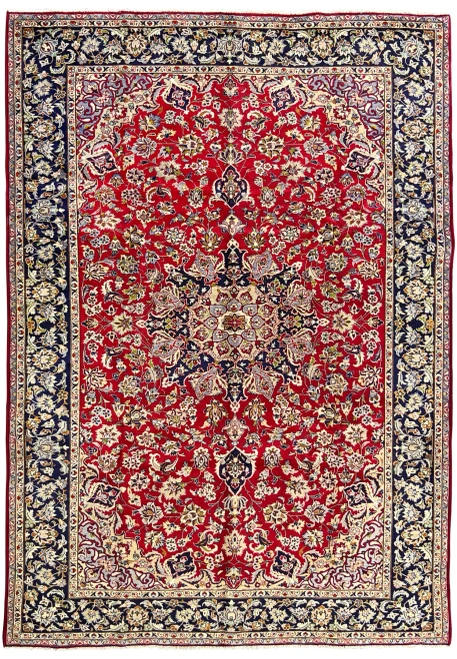 Hand-knotted wool Najafabad showing an allover floral field and central medallion in crimson and navy tones.