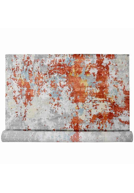 Full view of 14x18 modern abstract area rug with burnt orange eruptions on grey mosaic ground
