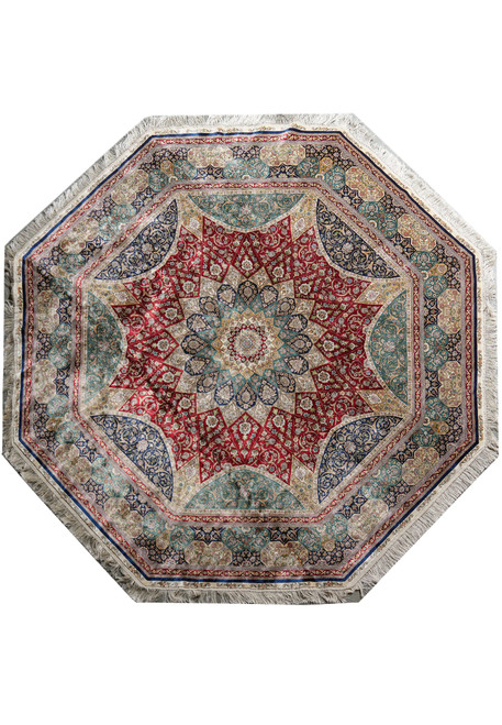 Whole octagonal silk rug seen from above, red domed medallion with green and navy corner spandrels