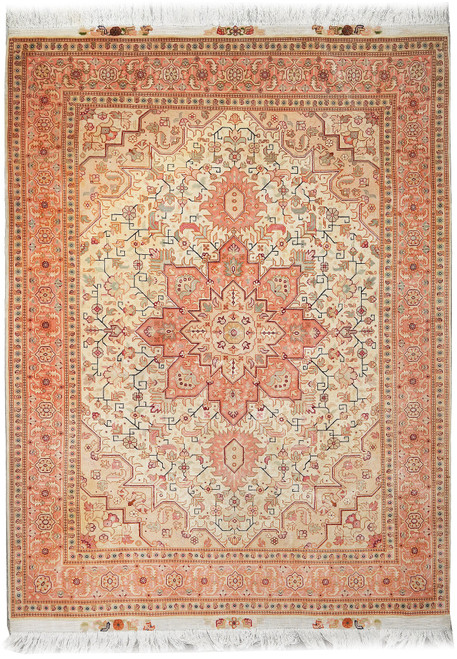 Full overhead view of the ivory field rug with coral star medallion and salmon border