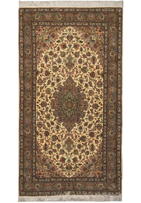 Full overhead view of the ivory Tabriz rug with grey-brown medallion and taupe floral border