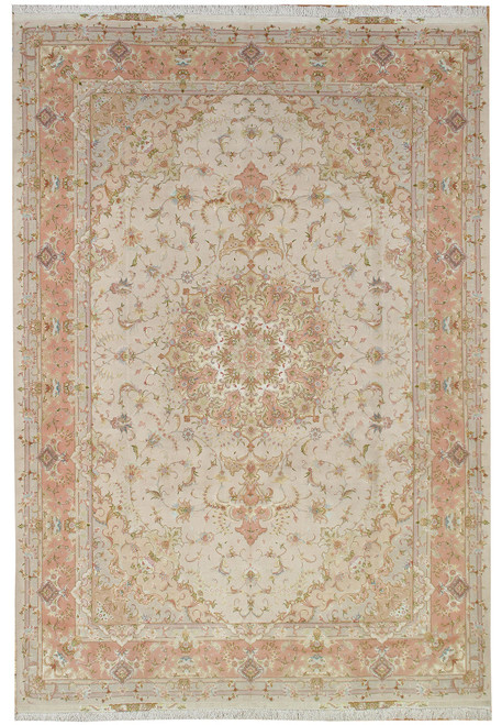 Overhead view of ivory and peach Persian Tabriz rug with floral medallion and wide border