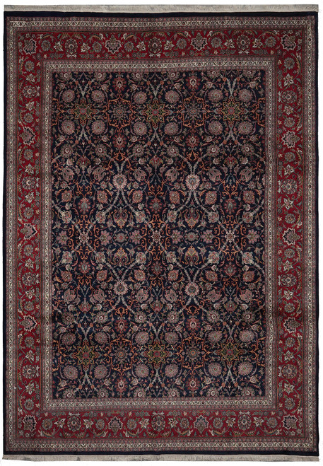 Navy blue all-over floral field framed by burgundy border on hand-knotted wool Oriental rug