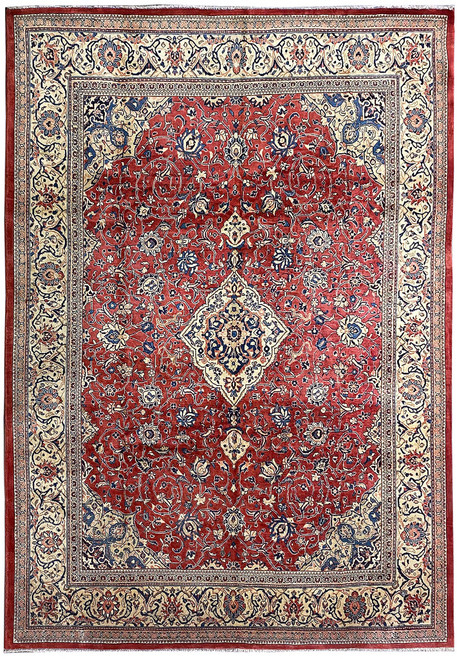 Full overhead view of 10' x 13' Persian Sarough rug with red field and ivory floral border
