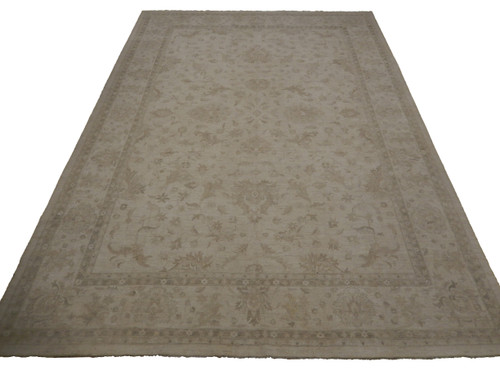 Oversize 13'6" x 19' Chobi Peshawar rug shown upright with ivory field and tonal floral border