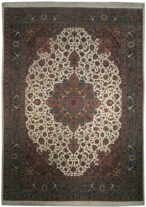 Full view of 9x12 Persian Tabriz rug with ivory field, floral medallion and teal blue border
