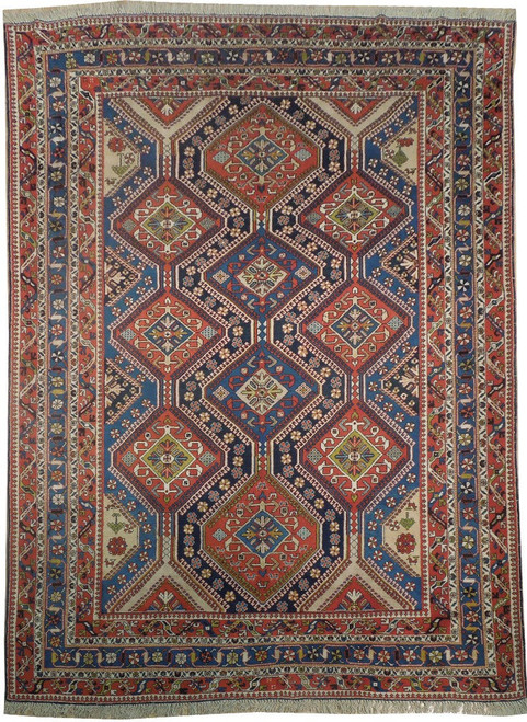 Flat overhead view of 8'9" x 11'3" Persian Yalameh rug with rust red diamond lattice