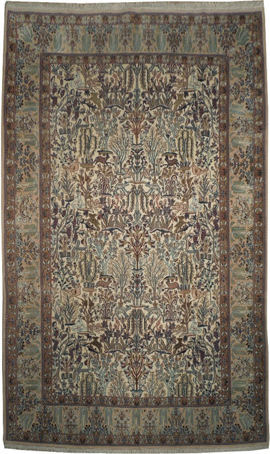 Full view of 6'9 x 11 Persian Nain rug with ivory tree of life field