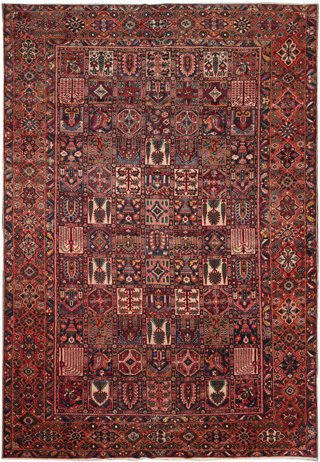 Overhead view of rust garden panel Persian rug with ivory compartments and wide floral border