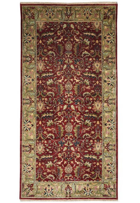 Full view of burgundy Indian oriental rug with olive green floral border and ivory fringe