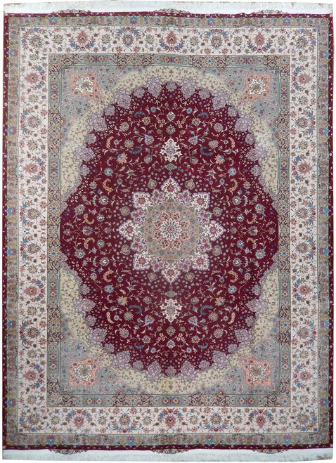 Burgundy Persian Tabriz rug with ivory floral border and green starburst medallion, full overhead view
