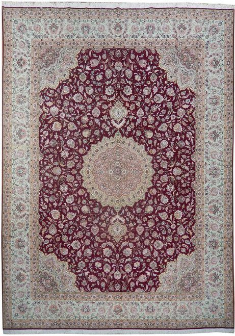 Burgundy Persian Tabriz rug with ivory star medallion, pale green floral border and wool silk pile