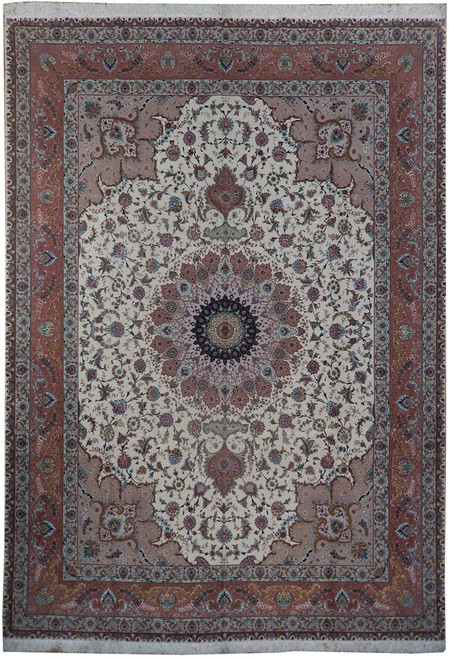 Ivory Persian Tabriz rug with coral border and navy dome medallion shown flat overhead