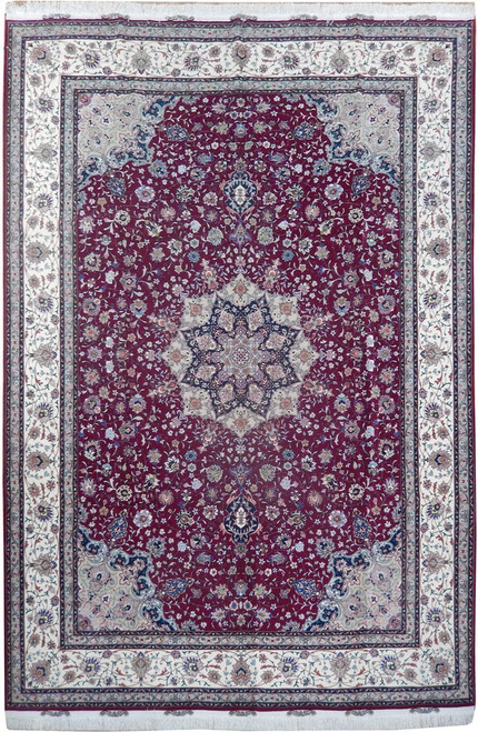 Ruby red Persian Tabriz rug with ivory floral border and navy ivory star medallion center
