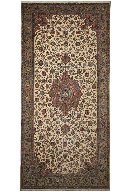 Full overhead view of ivory Persian Tabriz rug with rust medallion and olive green border