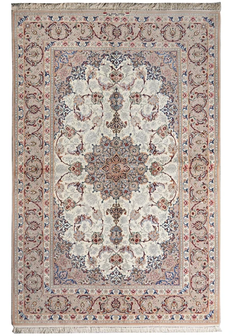 Full overhead view of ivory Persian Isfahan rug with blue rosette medallion and signed border
