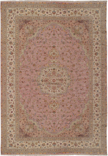 Overhead view of soft peach pink Persian Tabriz rug with ivory floral border and central medallion