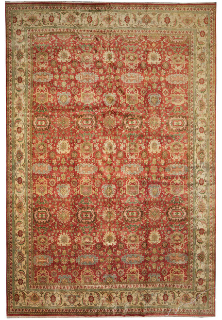 Oversize 14 x 20 Agra rug shown flat, warm red field framed by beige floral border