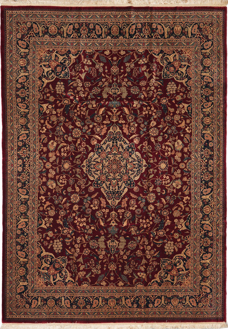 Overhead view of burgundy Kashan design rug with ivory medallion and dark navy floral border