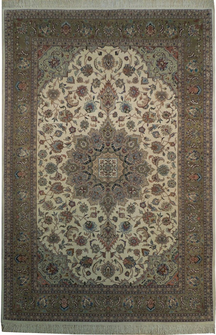 Ivory field Persian Tabriz rug with sage green border and layered central floral medallion, full view