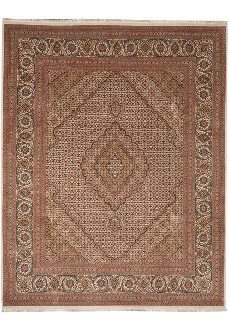 Overhead view of beige Mahi fish design Oriental rug with gold medallion and ivory border
