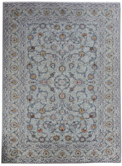 Full overhead view of 8'6" x 11'6" light green Persian Kashan rug with ivory floral border
