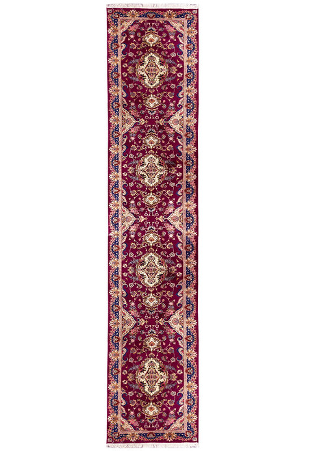 Full view of 2'9" x 16'7" Persian Tabriz runner with repeating ivory medallions on maroon field