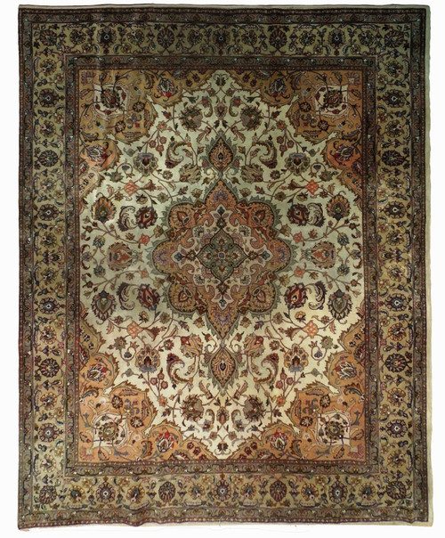 Ivory field Persian Tabriz rug with camel medallion, floral vine scroll and sage green border