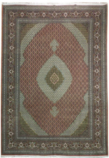 Full overhead view of rose field Tabriz rug with ivory diamond medallion and green spandrels
