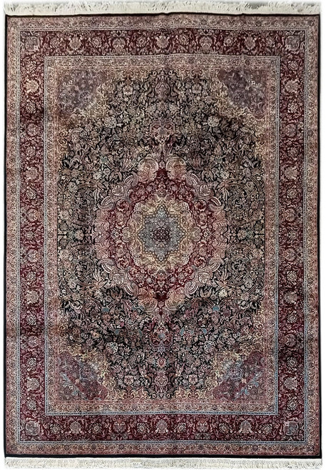 Overhead view of 8'6" x 11'8" black and burgundy wool and silk Tabriz design rug