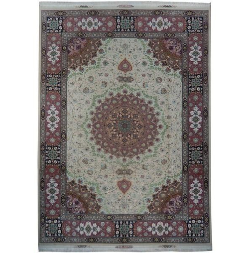 Ivory field Persian Tabriz rug with rose starburst medallion and navy floral guard borders