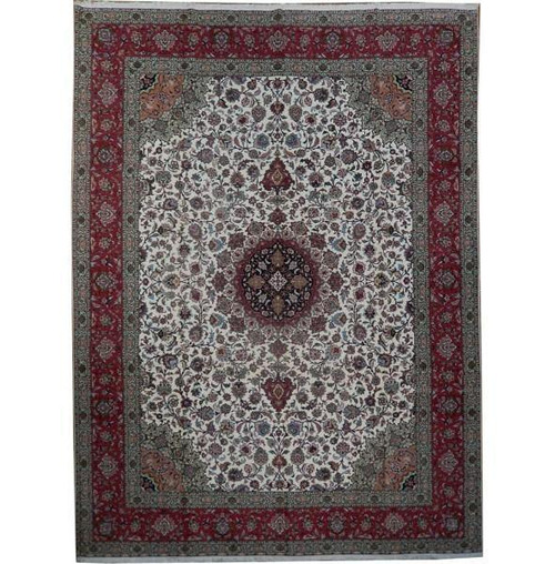 Ivory field Persian Tabriz rug with navy floral medallion and coral red border, full overhead view