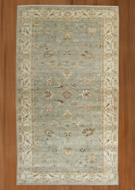10'1" x 26'3" sage green Indian Oushak runner rug with ivory floral border, full view